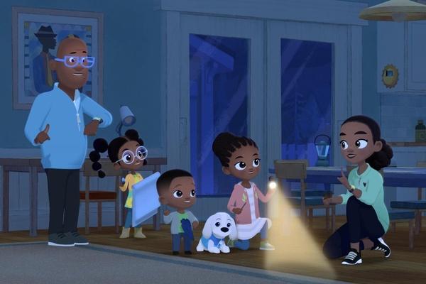 The Hunter family uses a flashlight when the electricity goes out due to a storm.