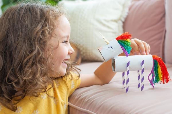 Girl with mini unicorn craft