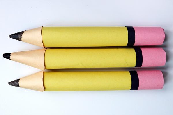 Make giant pencils out of cardboard to hold school supplies!
