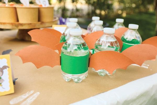 Closeup of water bottles on a table.