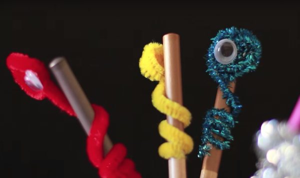 Image of bookworm pencil topper feature