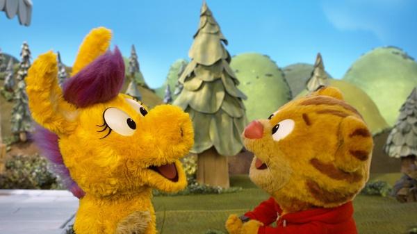 Donkey Hodie and Daniel Tiger are talking to each other in Someplace Else.