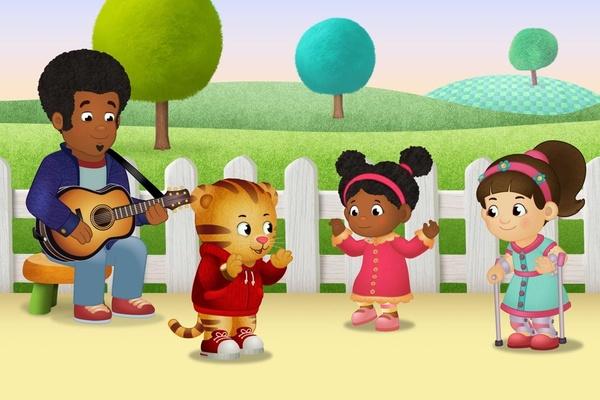 Daniel Tiger and his friends sing and dance while Music Man Stan plays guitar.