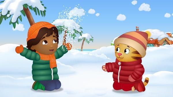 Episodic image of Juan Carlos and Daniel Tiger playing in the snow.