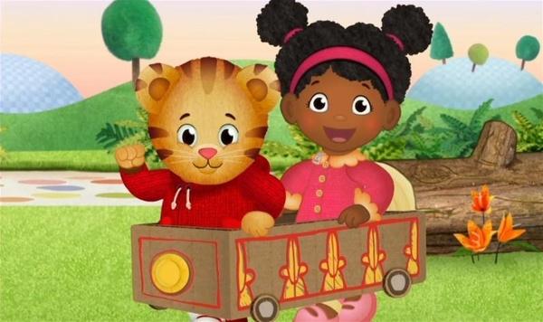 Image of Daniel Tiger and friend playing in a box.