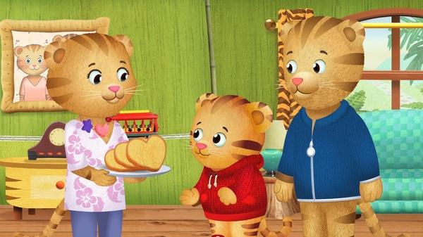Image of Daniel Tiger making banana bread with Mom Tiger.