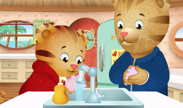 Image of Daniel Tiger and Dad Tiger washing their hands.