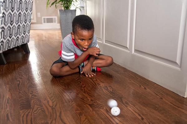 A child plays when things go bump.