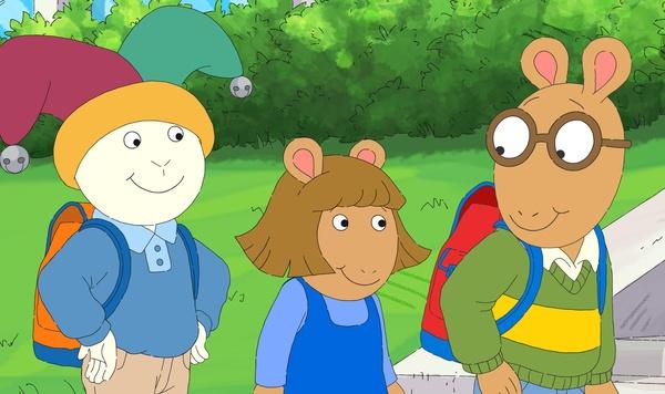 Buster, D.W., and Arthur smile at each other.