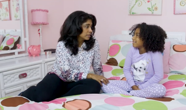 Image of mother and daughter talking.