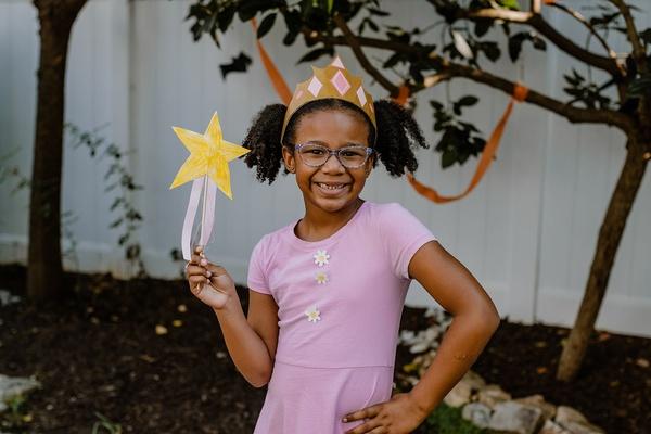 A child dressed as Pinkalicious