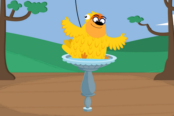 Ruff Ruffman vestido de pájaro sentado en una fuente para pájaros.
