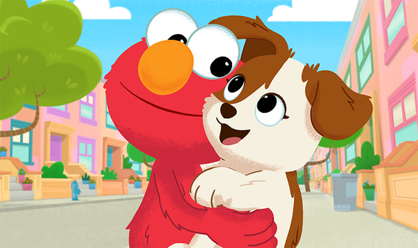 Elmo holding Tango.