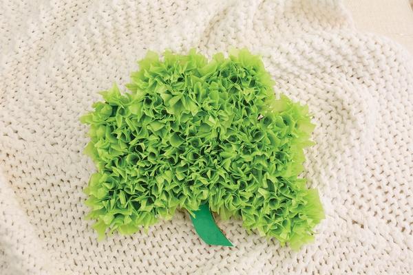 A finished tissue paper shamrock.