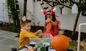 Children playing in the swamp monster sensory bin.