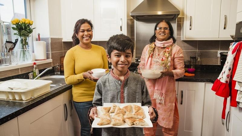 Family baking special treats together.