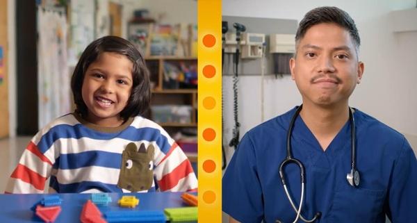 A child and a nurse talk through a video call.