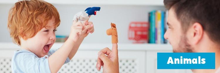 Image of father and child playing with animal finger puppets.