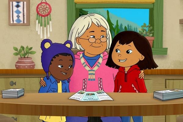 A photo of Auntie Midge talking with Molly and Trini.