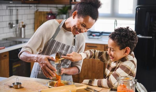 Image of mother baking with her son.