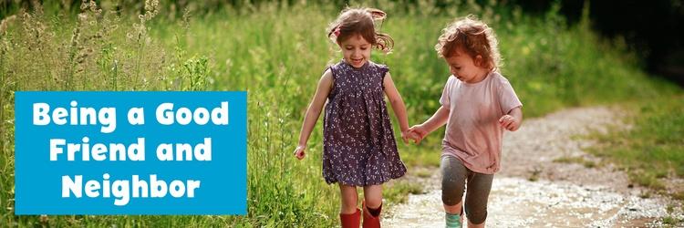 Two young girls holding hands.