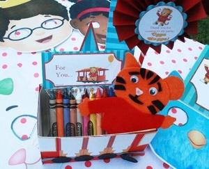 Pass out Daniel Tiger birthday party favors.