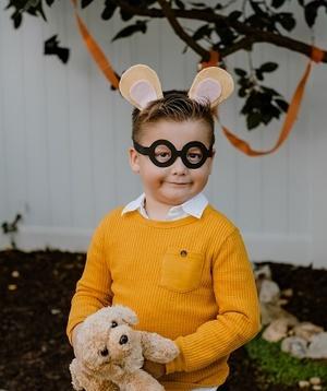 Child dressed as Arthur.