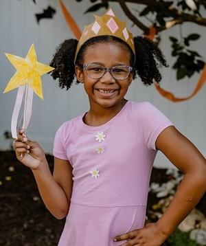 Child dressed as Pinkalicious.