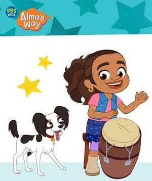 Alma playing a drum.