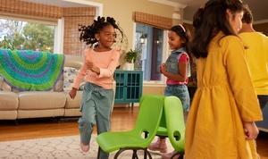 Children playing musical chairs.
