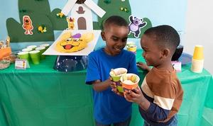 Kids eating veggies.