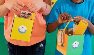 Kids holding party favors.