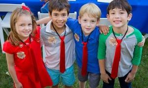 Party guests wearing their Odd Squad birthday party ties