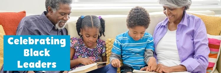 Grandparents reading with grandchildren.