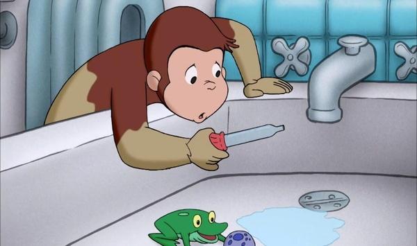 Curious George playing with water