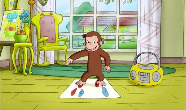 Curious George making red and blue patterned footprints