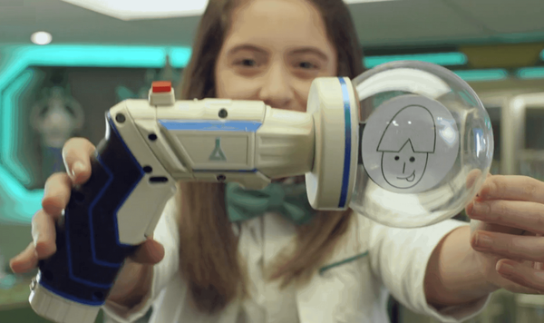Oona holding a gadget