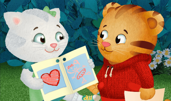 Katerina Kittycat shows Daniel Tiger the thank you card she made for her mom.