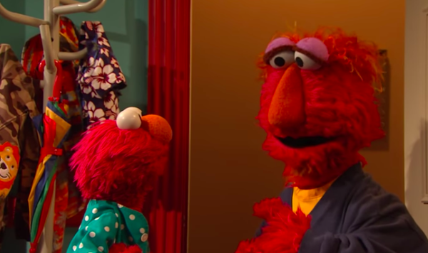 Image of Elmo and his dad.