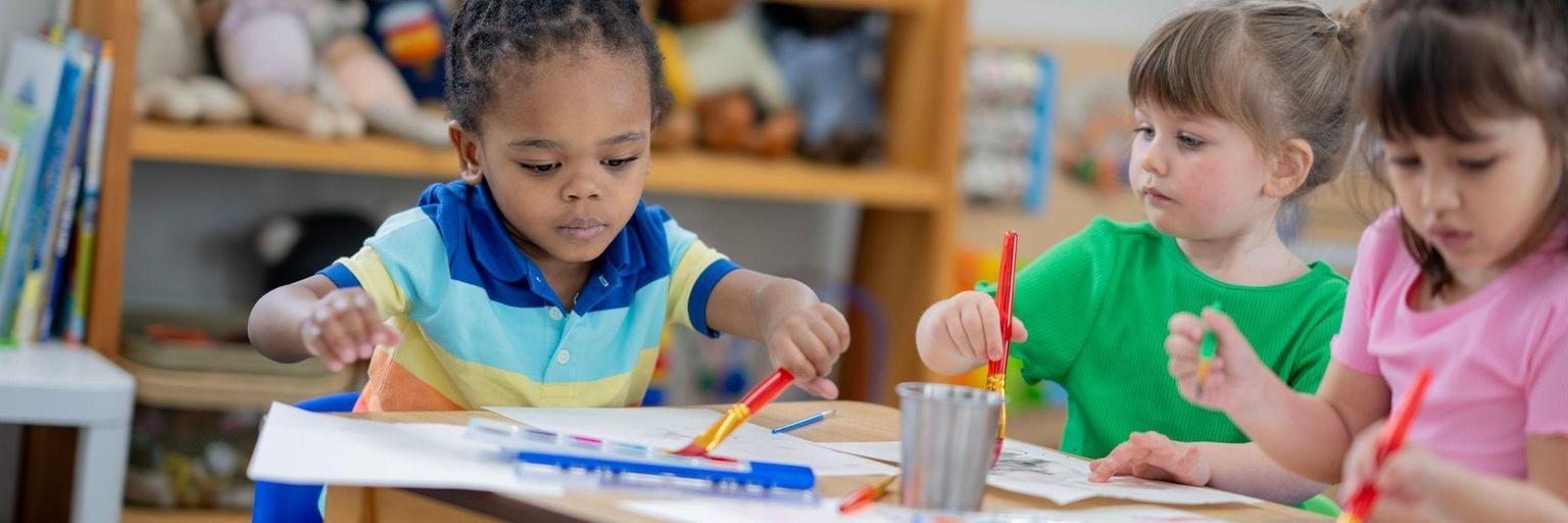 Image of boy painting.