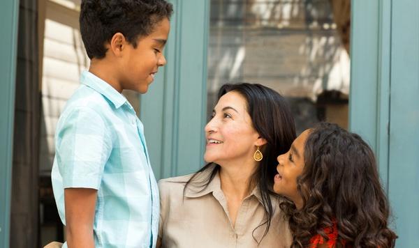 Mom talking to son and daughter.
