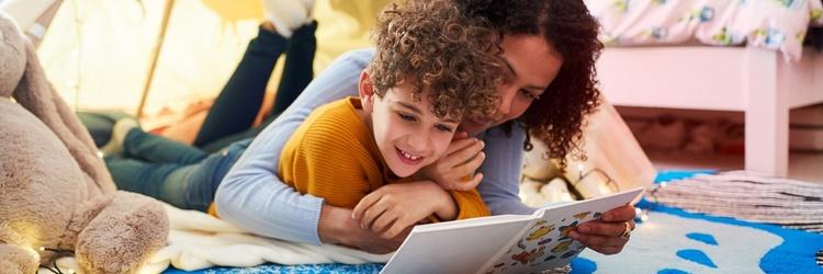 Mom and son reading together.