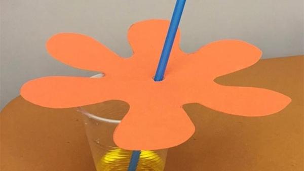 straw with flower pattern around it