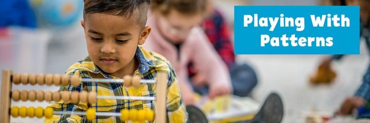 Boy playing with an abacus.