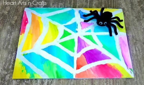 Image of watercolor resist spider webs
